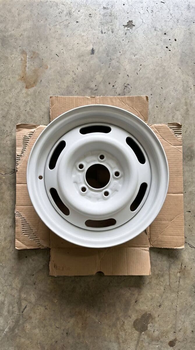 Clean bare-metal wheel after sandblasting